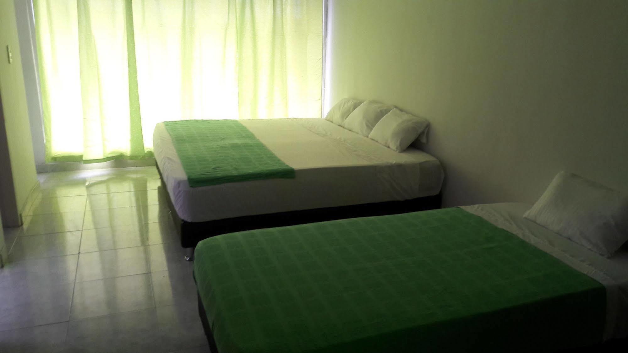 Hostal Deluxe Santander มานิซาเลส ภายนอก รูปภาพ